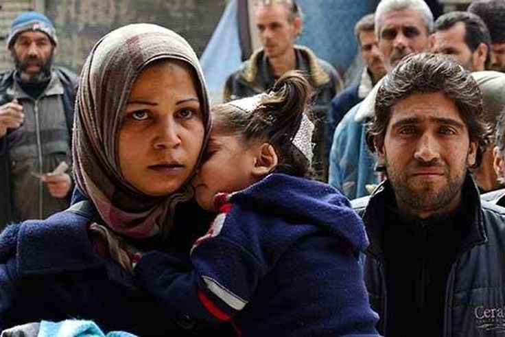 Short of cash, U.N. cuts Syria refugees' rations again