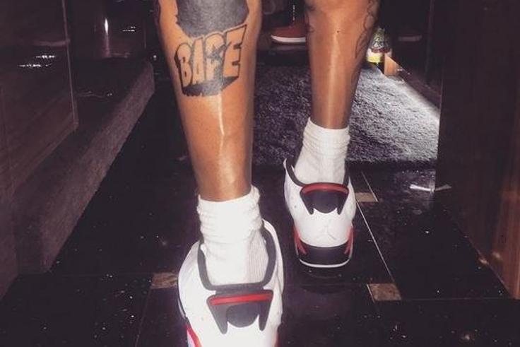 Chris Brown shows off his latest leg tattoos