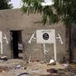 A wall painted by Boko Haram is pictured in Damasak, Nigeria March 24, 2015. REUTERS/Joe Penney