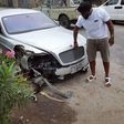 Timaya with his bashed Bentley