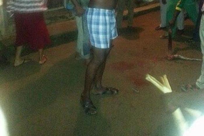 Man finds and kills massive python in the ceiling of his house at Ajegunle, Lagos state