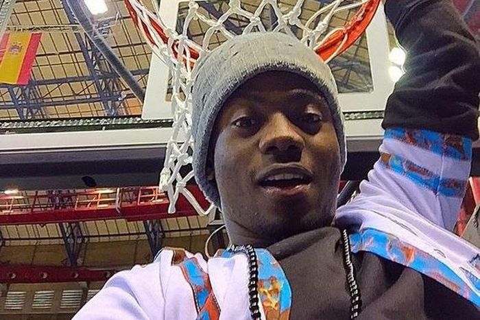 Korede Bello holding on to the rim