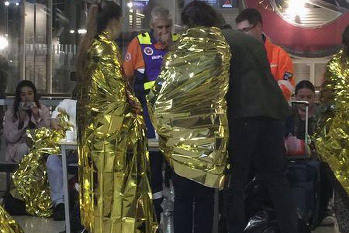 Hundreds of migrants on tracks at Calais block trains to UK