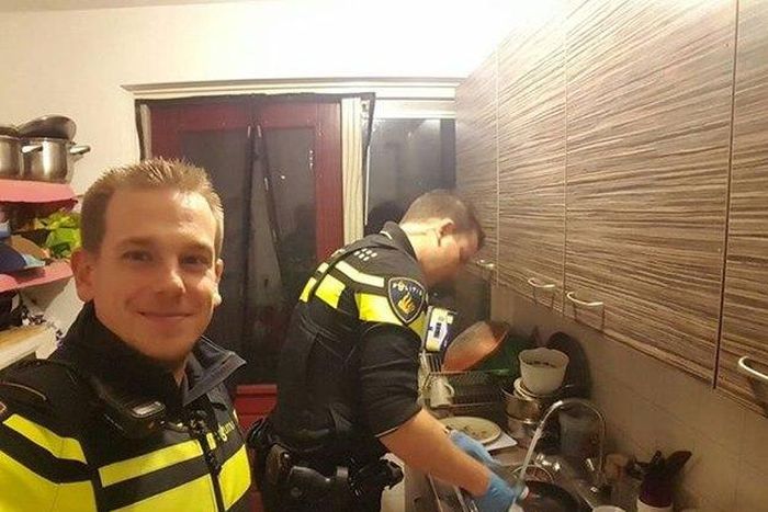 2 Police officers go viral after taking care of a sick woman's five children