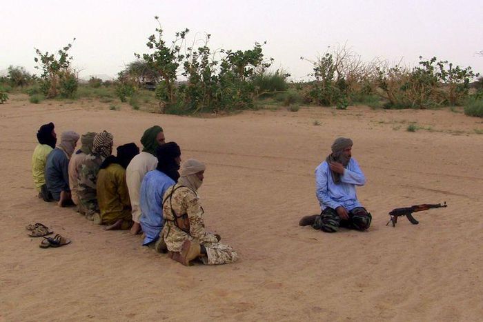 The leader of the Coordination of Azawad Movements (CMA), Mohamed Ag Najim (R), leads his men in prayer outside Anefis, Mali, August 26, 2015. REUTERS/Souleymane Ag Anara