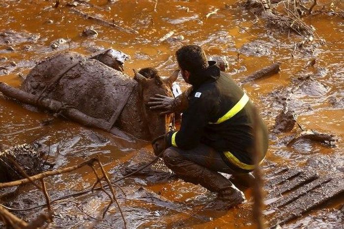 Few answers and 28 still missing three days after Brazil dams burst