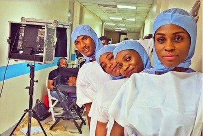 Cast of '93 Days' on set of movie