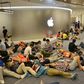 People queue outside an Apple Store in Naijing