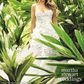 With her own nuptials approaching, Sophia Vergara looked naturally beautiful in a strapless gown by Marchesa as she stood in a lush garden during a shoot for Martha Stewart Weddings' magazine