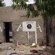 A wall painted by Boko Haram is pictured in Damasak, Nigeria March 24, 2015. REUTERS/Joe Penney