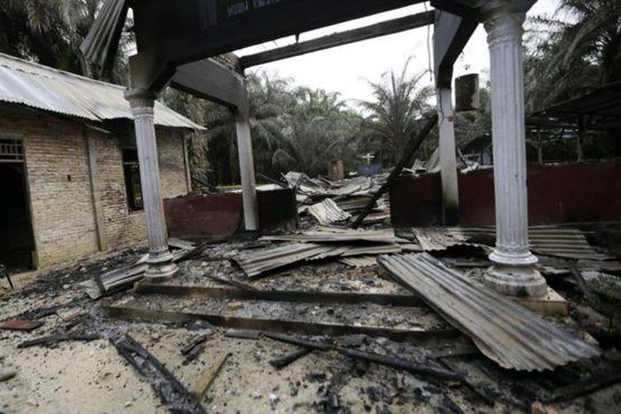 Tension has been building in Aceh province, where authorities have begun imposing Islamic law on religious minorities