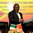 Abdulsamad Rabiu, Chairman, BUA Group and Tong Laigou, Board Chairman, SINOMA CBMI, shake hands and exchange documents after signing a USD600 million deal to expand BUA's cement capacity in Africa.