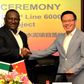 Abdulsamad Rabiu, Chairman, BUA Group and Tong Laigou, Board Chairman, SINOMA CBMI, shake hands and exchange documents after signing a USD600 million deal to expand BUA's cement capacity in Africa.