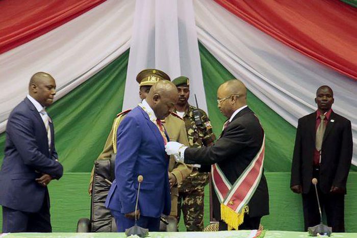 Burundi swears in new cabinet that some opponents condemn