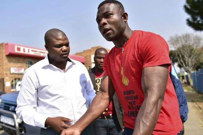 one of the bpodyguards speaking with daily sun