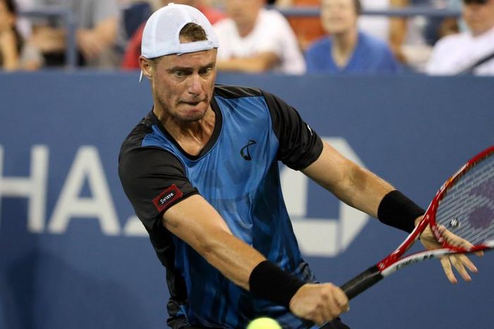 Bernard Tomic eliminates Lleyton Hewitt at US Open