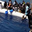 EU agrees bigger migrant relocation, but details unclear -draft