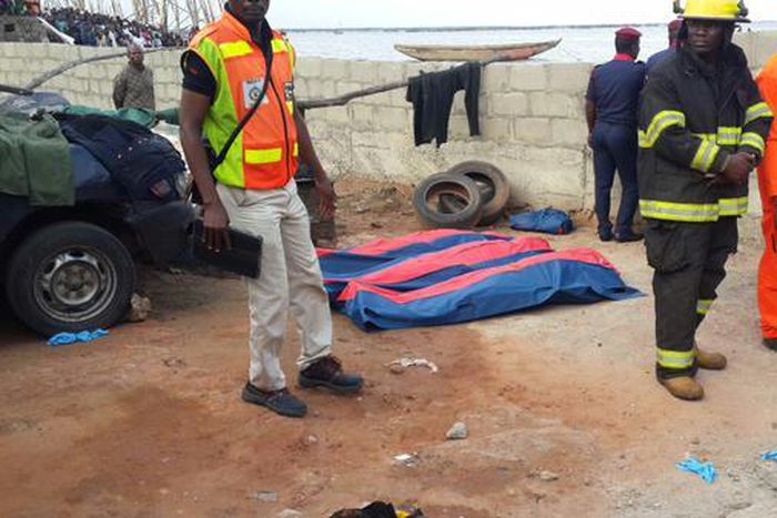 NEMA officials at the scene of a helicopter crash in Oworonshoki, Lagos on August 12, 2015