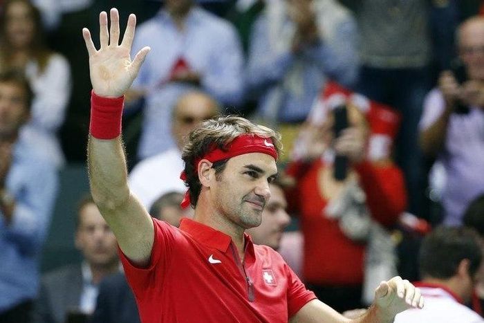 Switzerland's Roger Federer reacts after winning his Group play-off tennis match against Theimo de Bakker of the Netherlands at the Palexpo Arena in Geneva, Switzerland September 20, 2015.  REUTERS/Denis Balibouse