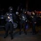 Tunisian police officers are pictured after an attack on a military bus in Tunis, Tunisia November 24, 2015. REUTERS/Zoubeir Souissi