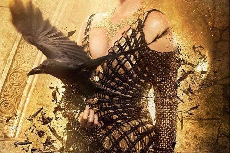 Charlize Theron as the Evil Queen