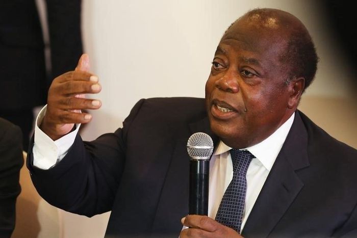 Charles Konan Banny, candidate for the 2015 presidential election and member of ruling coalition of RHDP attends a news conference in Abidjan February 26, 2015. REUTERS/Thierry Gouegnon