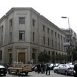 People and vehicles are seen caught in a traffic jam in front of the Central Bank of Egypt's headquarters in downtown Cairo March 17, 2013   REUTERS/Amr Abdallah Dalsh