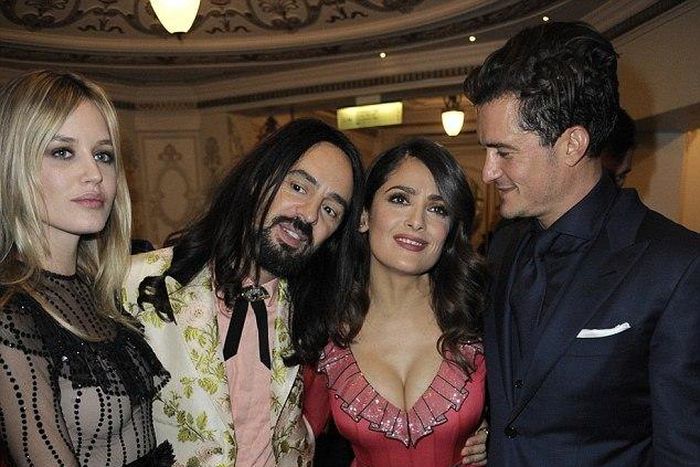 Orlando Bloom stris at Salma Hayeks' massive cleavage at BFAs in London