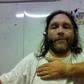 White skinned man who claims he turned dark skinned after injecting himself with controversial drug