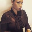 African American R&B singer, Jennifer Hudson, stunning on low cut