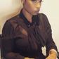African American R&B singer, Jennifer Hudson, stunning on low cut