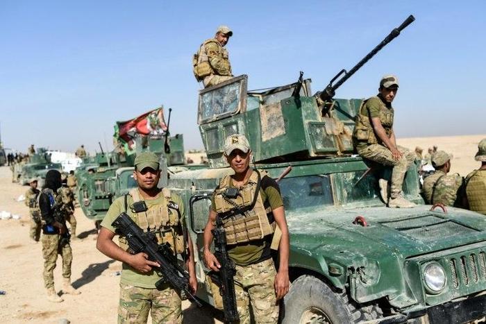 Forces from Iraq's elite Rapid Response Division, at the forefront of the southern advance on Mosul, deployed near the village of Tall al-Tibah, some 30 kilometres south of the jihadist-held city on October 21, 2016