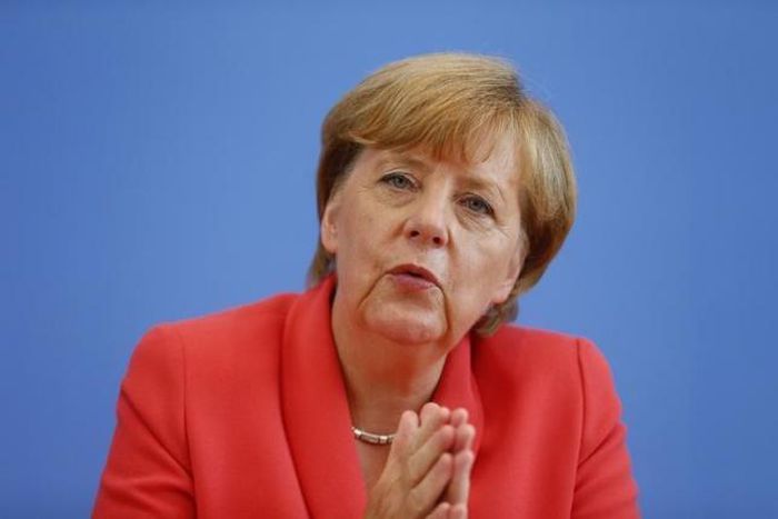 Germany's Merkel says refugees should be distributed fairly across EU