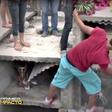 Relatives of the deceased smashing into her tomb after claiming to hear her screaming for help
