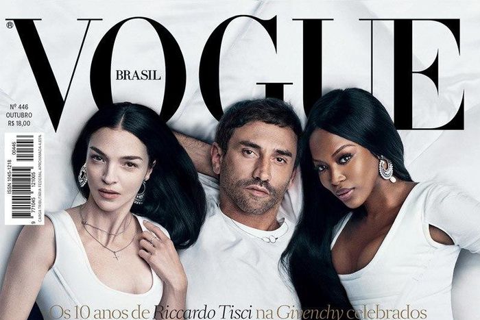Givenchy's creative director Riccardo Tisci is pictured in bed with muses Naomi Campbell and Mariacarla Boscono for Vogue Brazil's latest issue.