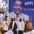Pascal Affi N'Guessan of the Ivorian Popular Front (FPI) party poses for pictures with chiefs after a ceremony for his official inauguration as a presidential candidate for Ivory Coast's upcoming presidential election, at the Culture Palace of Abidjan ...