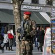A French paratrooper patrols in the center of Lyon, France, November 27, 2015.