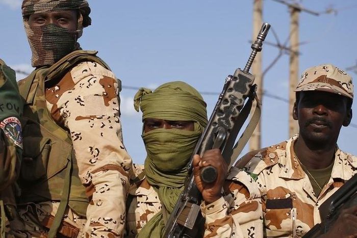 Chadian soldiers drive in their vehicle in Bangui April 4, 2014. REUTERS/Goran Tomasevic