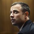 "Blade Runner" Oscar Pistorius sits in the dock in the North Gauteng High Court in Pretoria, in this file picture taken March 4, 2014.    REUTERS/Antoine de Ras/Pool /Files