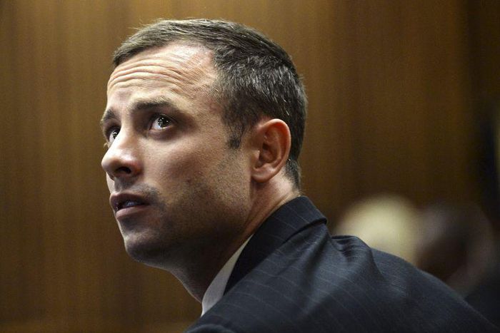 "Blade Runner" Oscar Pistorius sits in the dock in the North Gauteng High Court in Pretoria, in this file picture taken March 4, 2014.    REUTERS/Antoine de Ras/Pool /Files