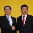 Chinese President Xi Jinping shakes hands with Taiwan"s President Ma Ying-jeou during a summit in Singapore November 7, 2015.