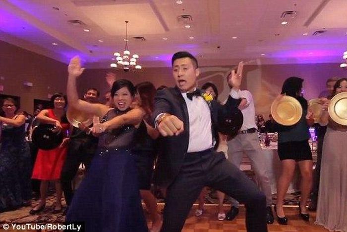 Robert Ly and Teresa Chan, from Orlando, surprised their 250 guests at the end of their wedding reception with a mission to record a seven-minute long music video