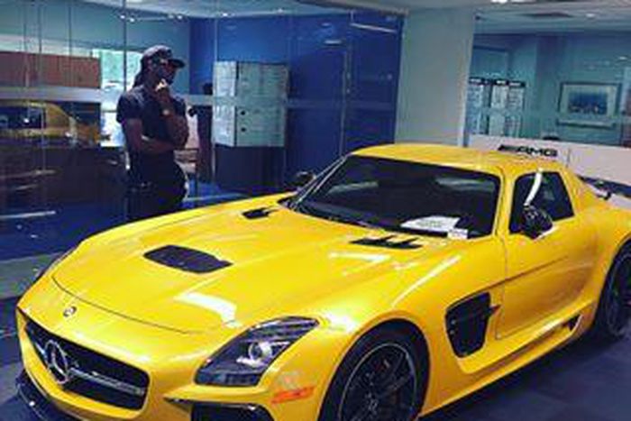 Paul and a 2014 Mercedes Benz SLS black
