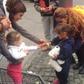 The adorable and heartwarming picture of a little German girl sharing her weekend sweets with a newly arrived refugee has gone viral.