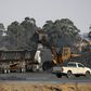 Coal is loaded onto a truck at the Woestalleen colliery near Middleburg in Mpumalanga province, September 8, 2015. REUTERS/Siphiwe Sibeko