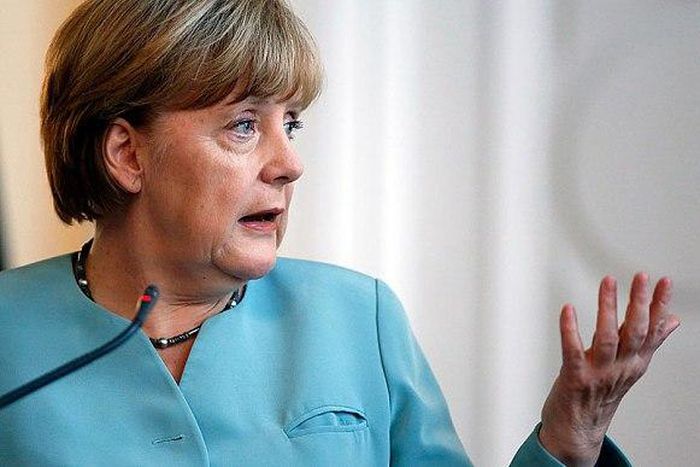 Merkel presses for European refugee response after weekend flood