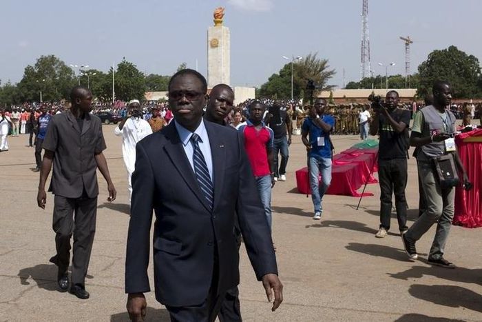 Burkina Faso interim President Michel Kafando attends an official funeral service for victims of the failed military coup in the Place de la Revolution in Ouagadougou, Burkina Faso, October 9, 2015. REUTERS/Arnaud Brunet