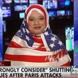 Woman responds perfectly to Donald Trump by putting on an American flag hijab
