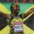 Athletics-Fraser-Pryce wins third world 100 metres title