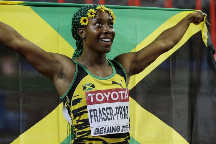 Athletics-Fraser-Pryce wins third world 100 metres title
